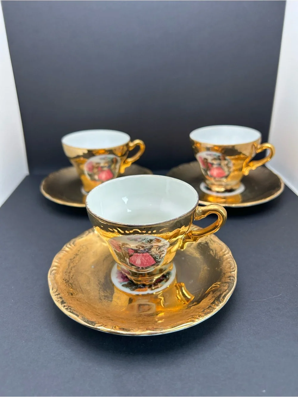 Vintage Golden Courting Colonial Couple Cup and Saucer